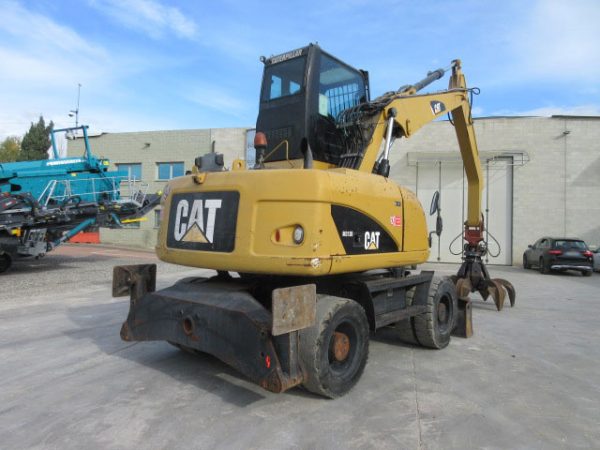 Caterpillar M313D 자재 처리기